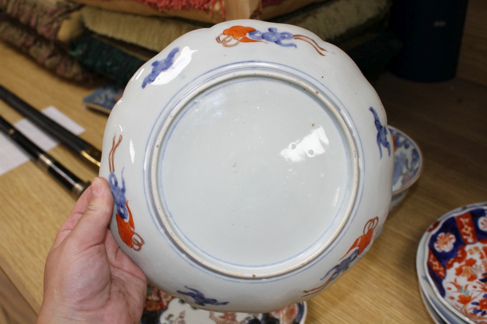 Seven Japanese Imari dishes and a stem bowl, Meiji period